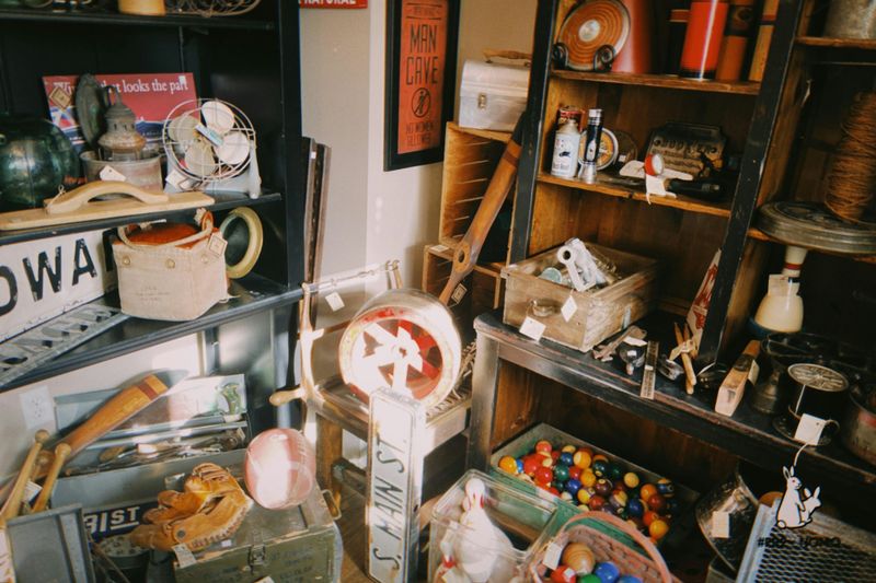 Collection of vintage items on shelves and floor - Free Photo on Unsplash